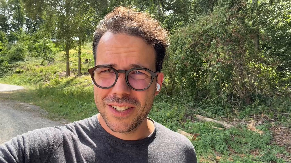 Thorsten Ball recording outdoors on a country path